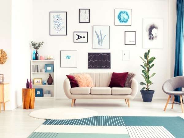 A living room with a photo gallery