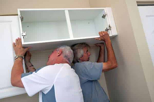 Lifting Cabinets Carefully To Avoid Damage