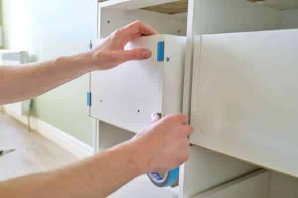 Utilizing Adhesive Organizers On Cabinet Doors