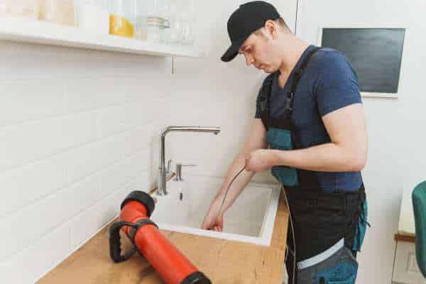 The Role of a Plunger and Plumber’s Snake in Drain Cleaning